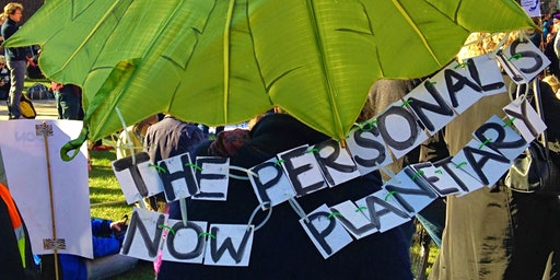 Activists holding a banner